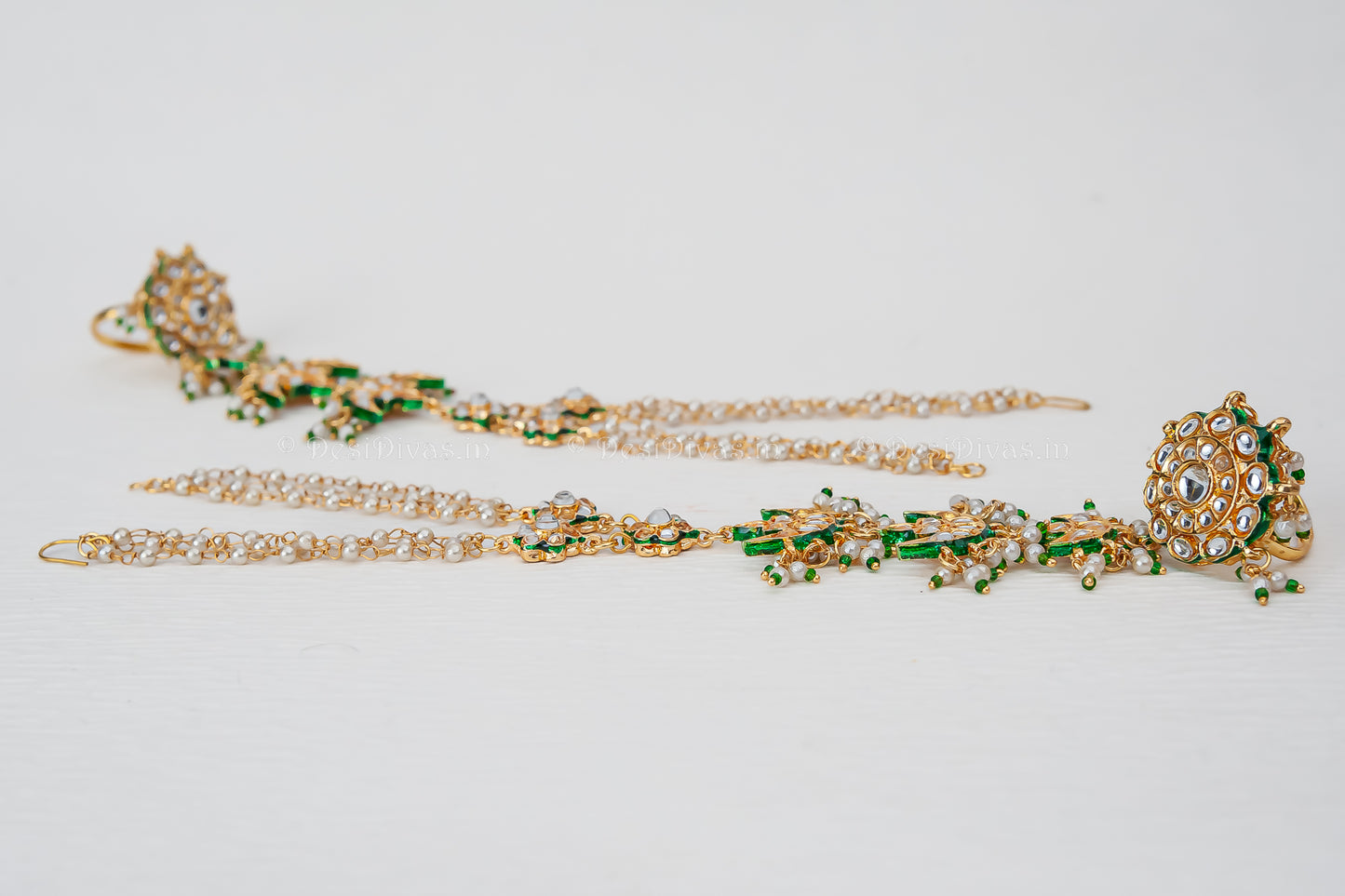 Elegant Gold finished Kundan Pearl bracelet with Ring